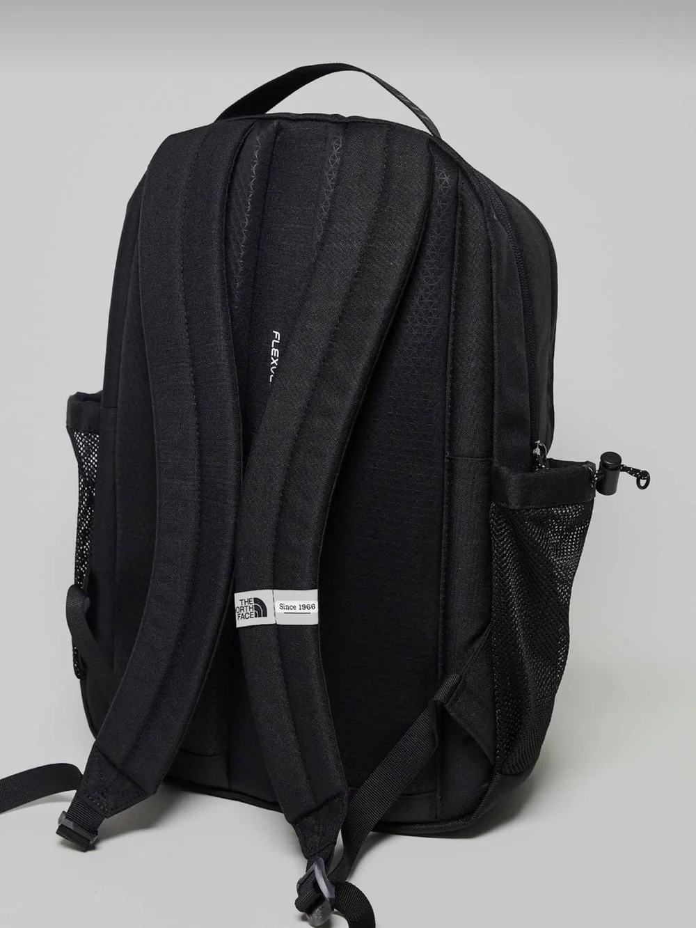 The North Face Bozer III backpack in black/green